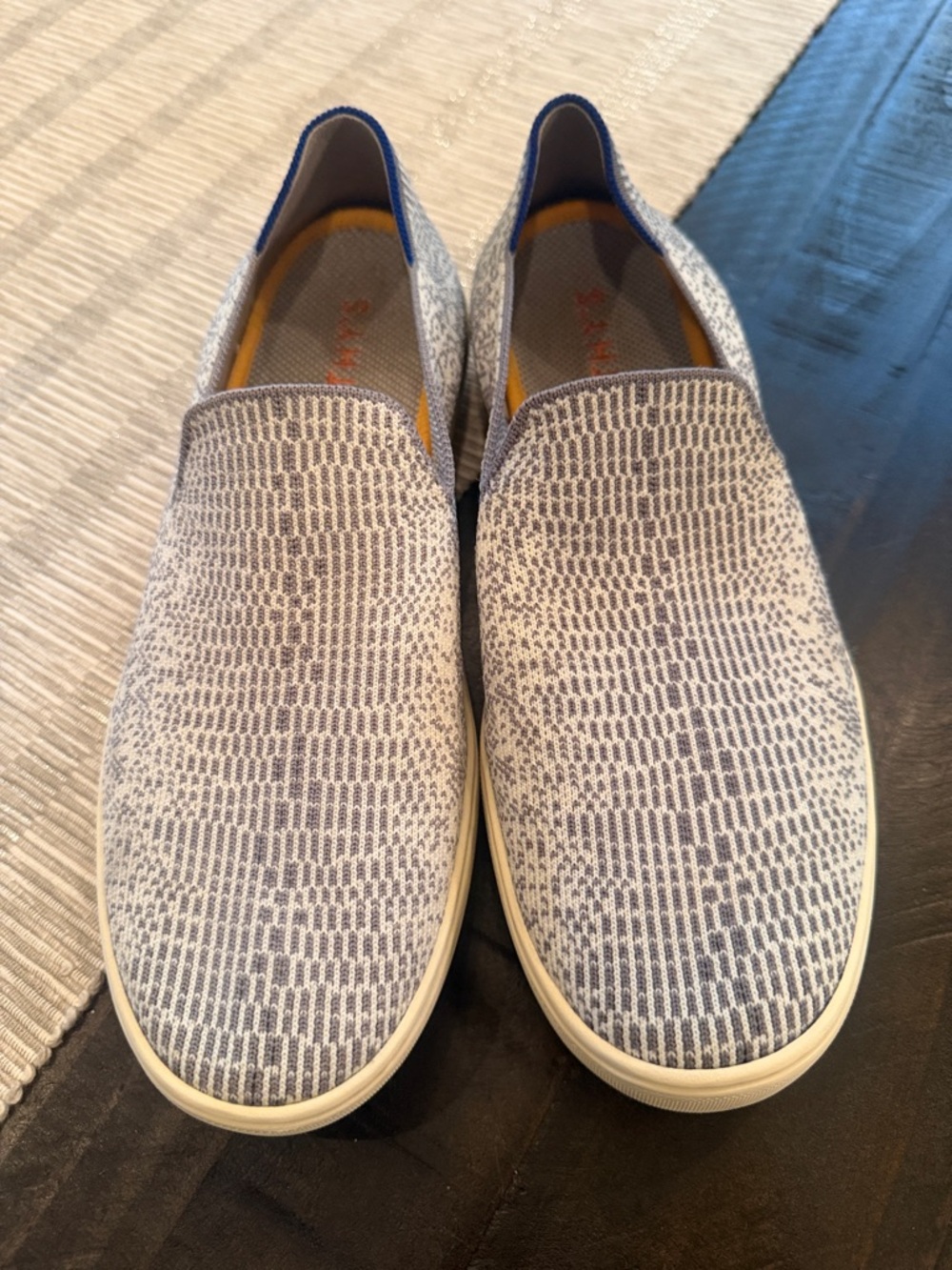 Rothy's Women's Slip-On Flats in Light Gray and white